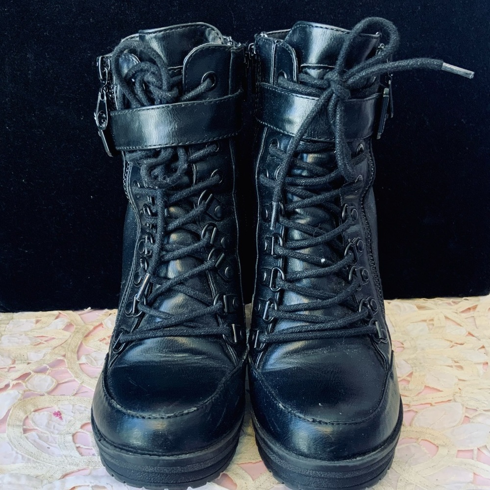 Black ankle boots by Guess.